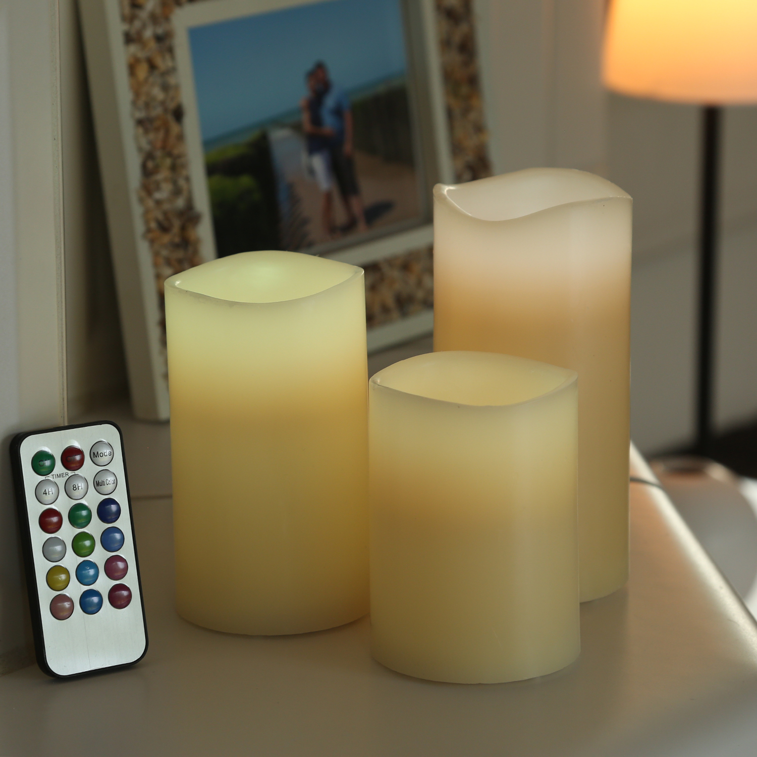 LED Kerze MULTI - Echtwachs - bunte LED - D: 7,5cm - inkl. Fernbedienung - Timer - creme - 3er Set LED Kerze MULTI - Echtwachs - bunte LED - D: 7,5cm - inkl. Fernbedienung - Timer - creme - 3er Set
