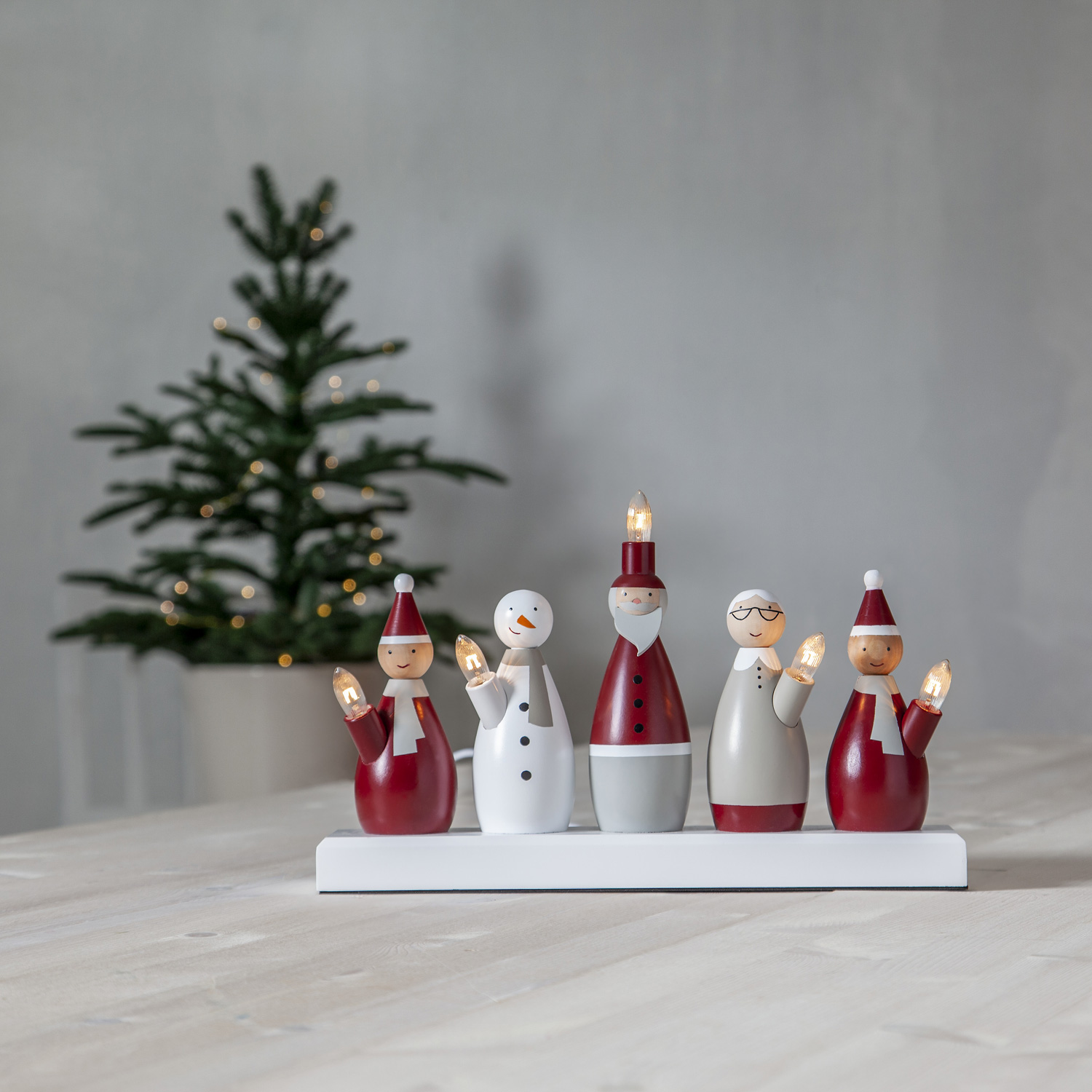 Fensterleuchter Weihnachtsmann - 5flammig - warmweiße E10 Glühlampen - H: 20,5cm, L. 33,5cm - rot Fensterleuchter Weihnachtsmann - 5flammig - warmweiße E10 Glühlampen - H: 20,5cm, L. 33,5cm - rot
