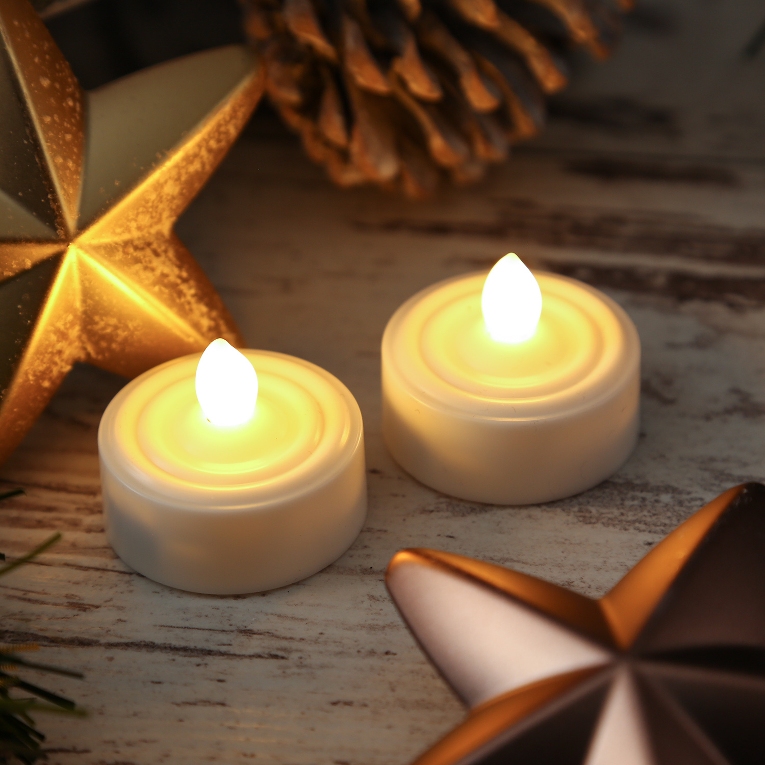LED Teelicht 12er Set "Paulo" - warmweiße flackernde Flamme - Batteriebetrieb - Timer - H: 2,9cm LED Teelicht 12er Set "Paulo" - warmweiße flackernde Flamme - Batteriebetrieb - Timer - H: 2,9cm