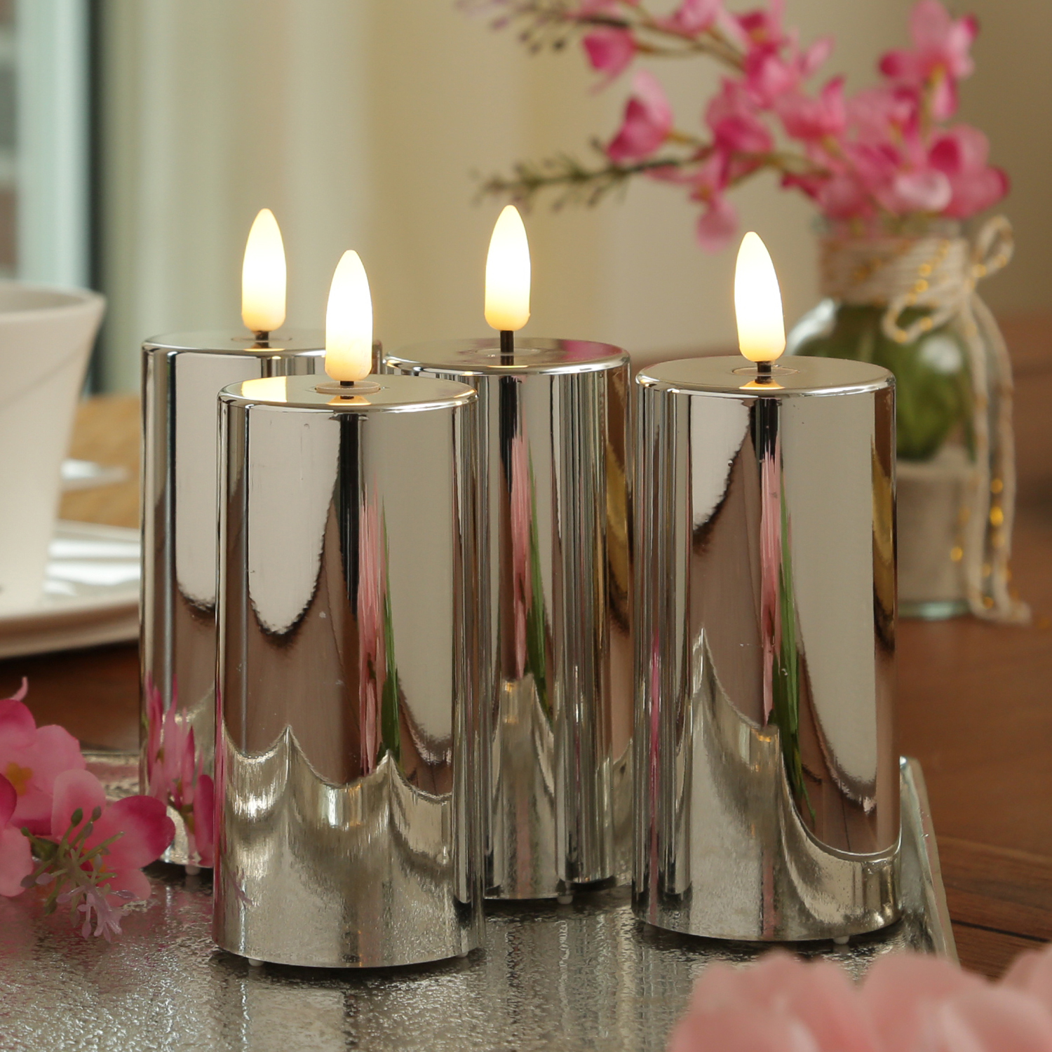LED Kerzenset - Kunststoff - Timer - H: 12,5cm - D: 5cm - silber glänzend - 4er Set LED Kerzenset - Kunststoff - Timer - H: 12,5cm - D: 5cm - silber glänzend - 4er Set