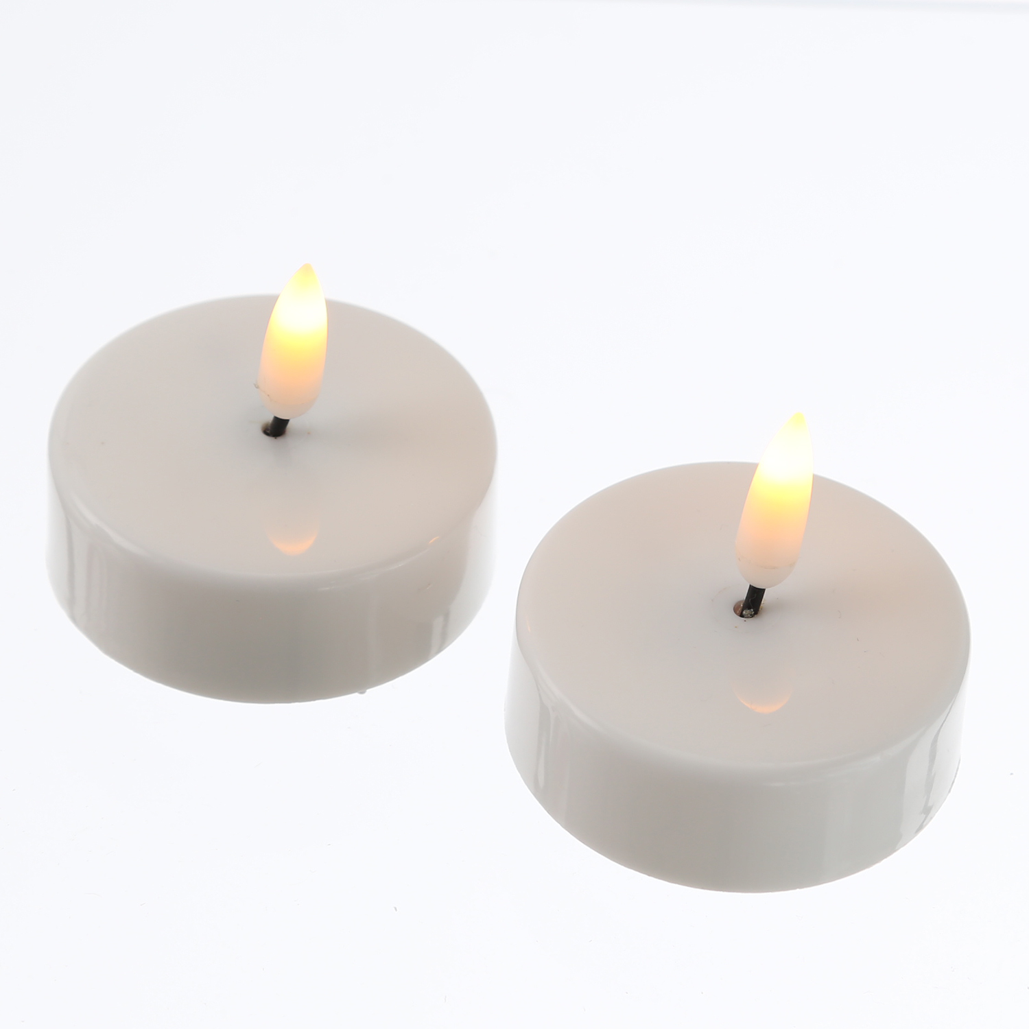 LED Teelicht - flackernde 3D Flamme - Batteriebetrieb - Timer - D: 5,8cm - weiß - 2er Set LED Teelicht - flackernde 3D Flamme - Batteriebetrieb - Timer - D: 5,8cm - weiß - 2er Set