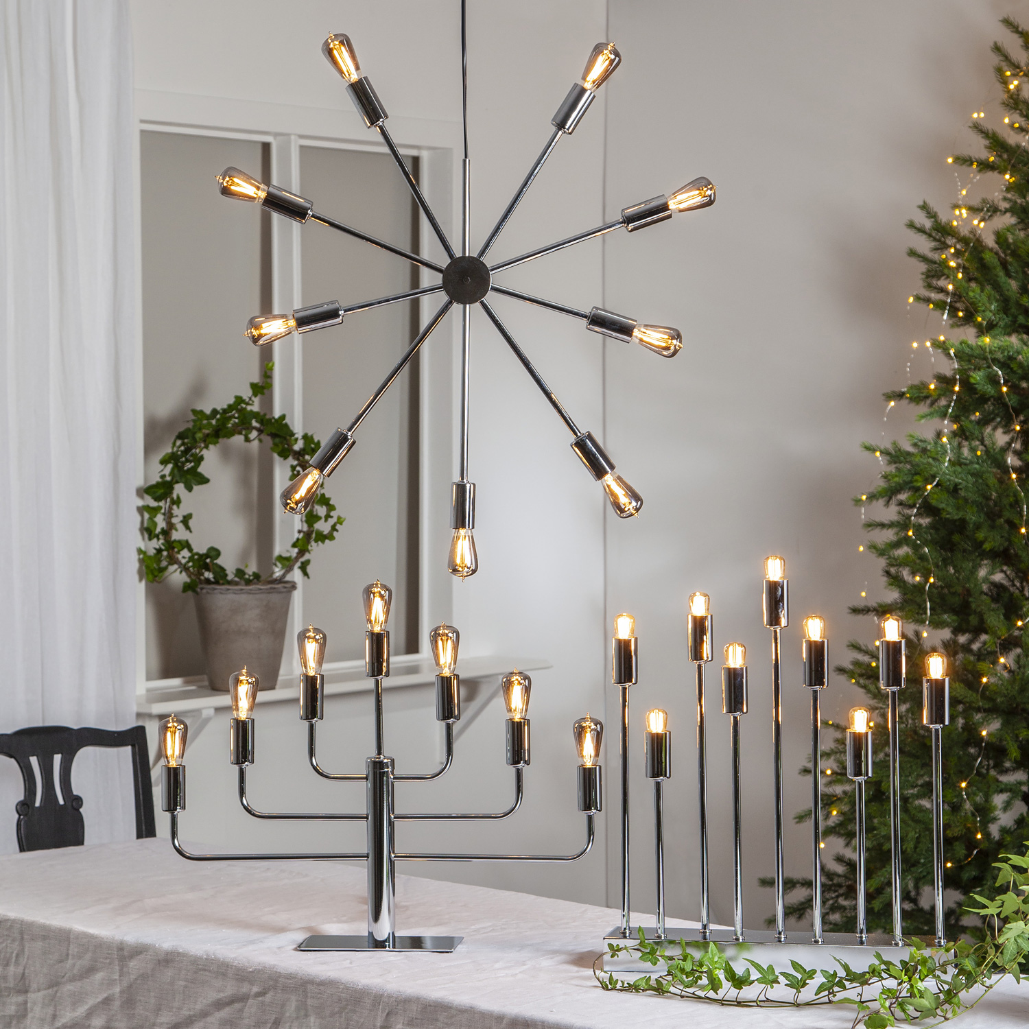 Kerzenleuchter Pix - Tischleuchte - 7-armig - E14 Fassung - H: 40cm, L: 57cm - silber Kerzenleuchter Pix - Tischleuchte - 7-armig - E14 Fassung - H: 40cm, L: 57cm - silber