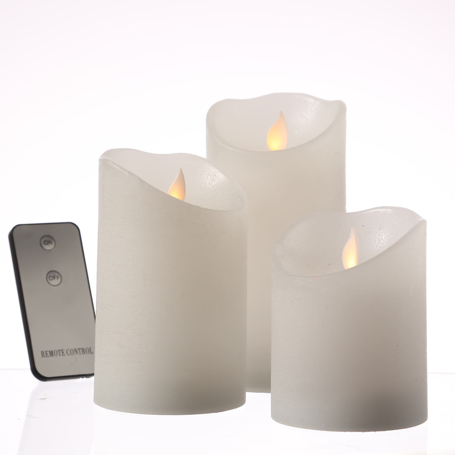 LED Kerzenset M-TWINKLE - Echtwachs - mechanisch bewegte Flamme - Fernbedienung - weiß - 3er Set LED Kerzenset M-TWINKLE - Echtwachs - mechanisch bewegte Flamme - Fernbedienung - weiß - 3er Set