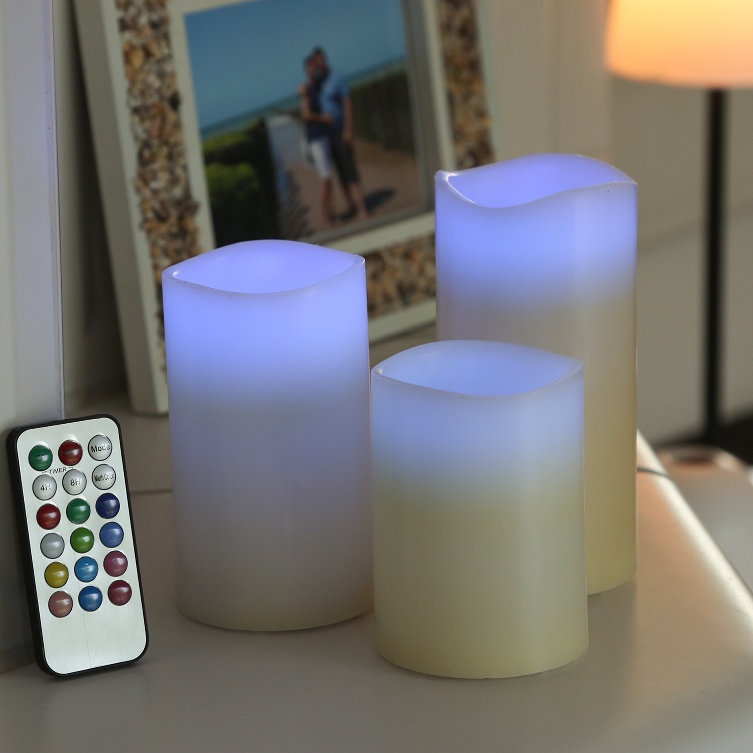 LED Kerze MULTI - Echtwachs - bunte LED - D: 7,5cm - inkl. Fernbedienung - Timer - creme - 3er Set LED Kerze MULTI - Echtwachs - bunte LED - D: 7,5cm - inkl. Fernbedienung - Timer - creme - 3er Set