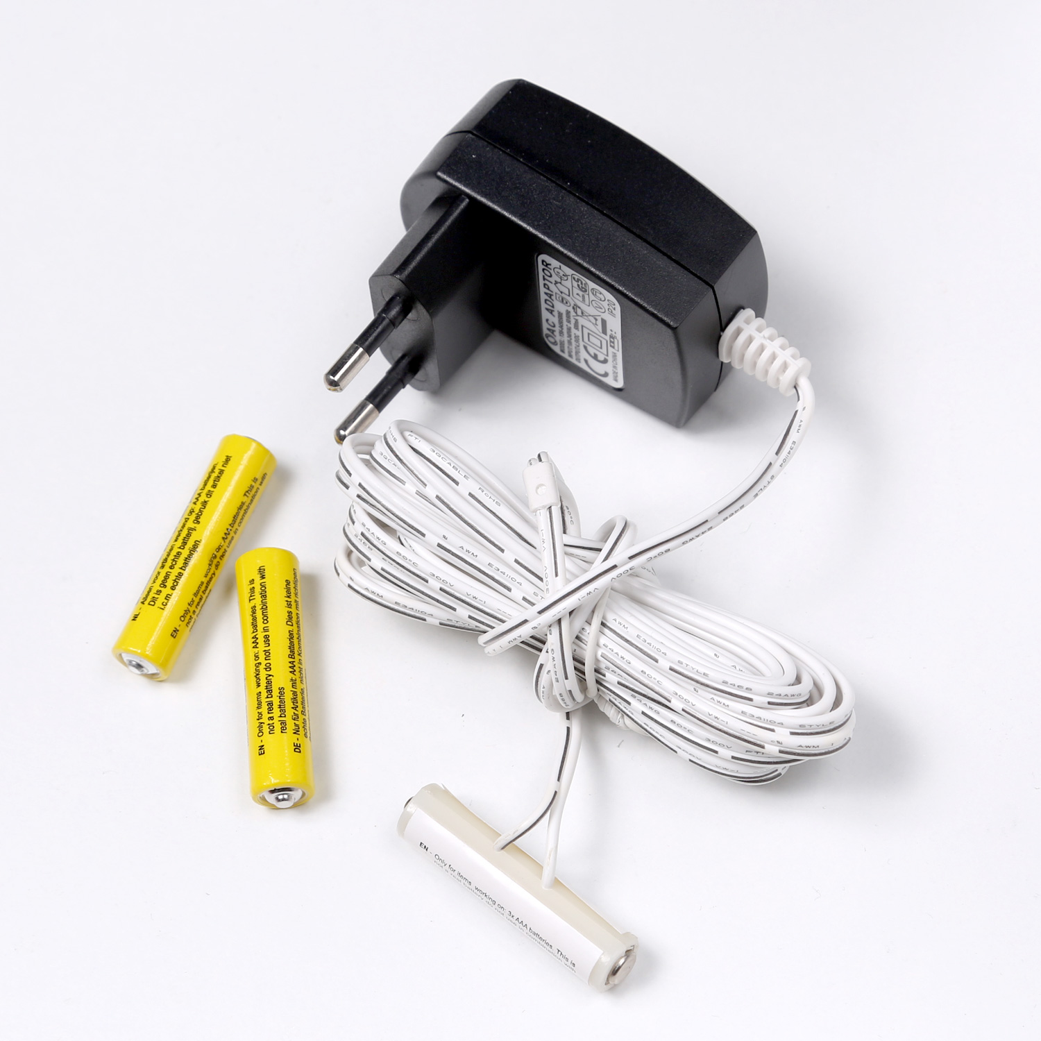 Netzadapter für Batterieartikel 3xAAA - Batterie Eliminator - Ersetzt 3 Microbatterien - Innen Netzadapter für Batterieartikel 3xAAA - Batterie Eliminator - Ersetzt 3 Microbatterien - Innen