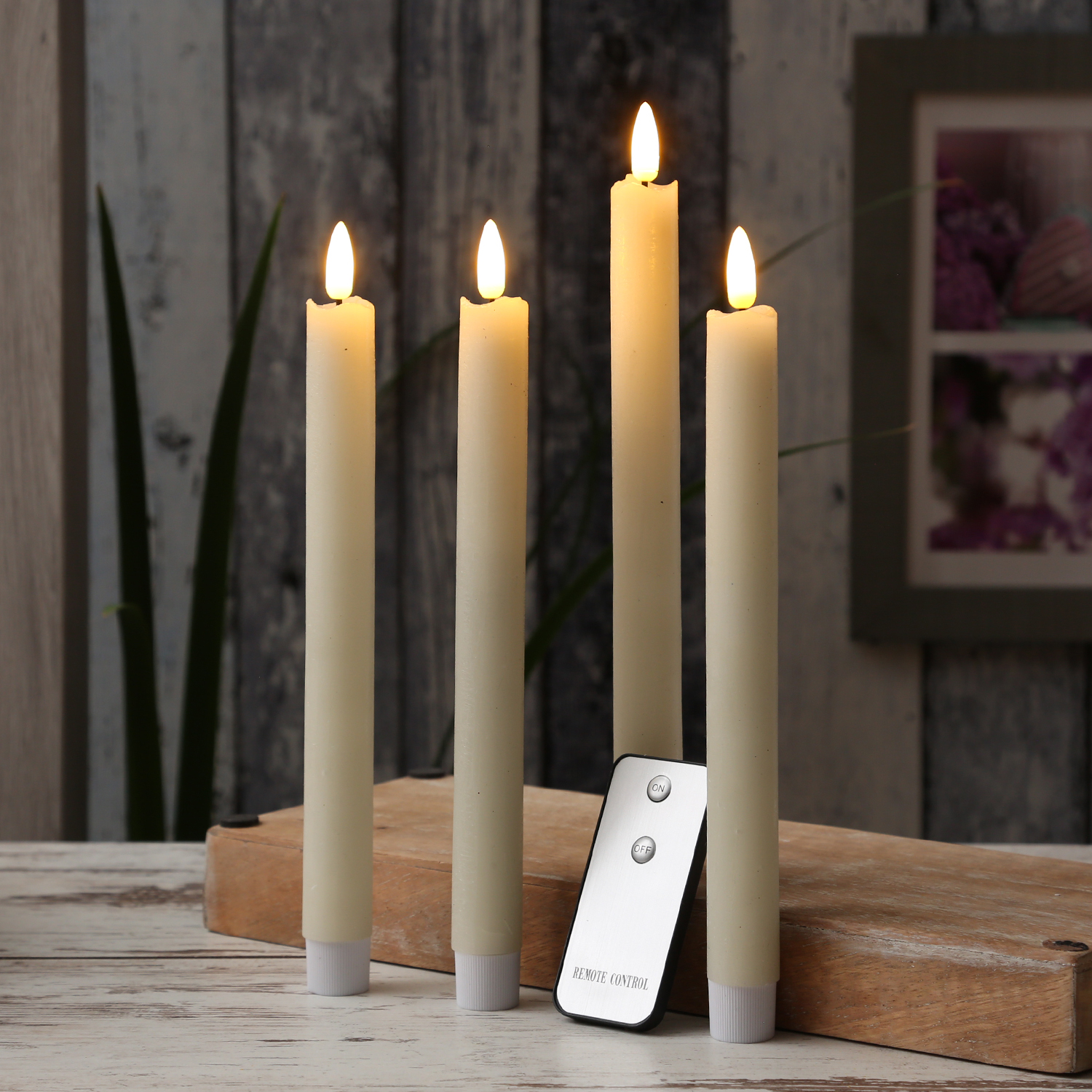 LED Stabkerzen Flamme - Echtwachs - flackernde 3D Flamme - H: 24cm - Fernbedienung - creme - 4er Set LED Stabkerzen Flamme - Echtwachs - flackernde 3D Flamme - H: 24cm - Fernbedienung - creme - 4er Set
