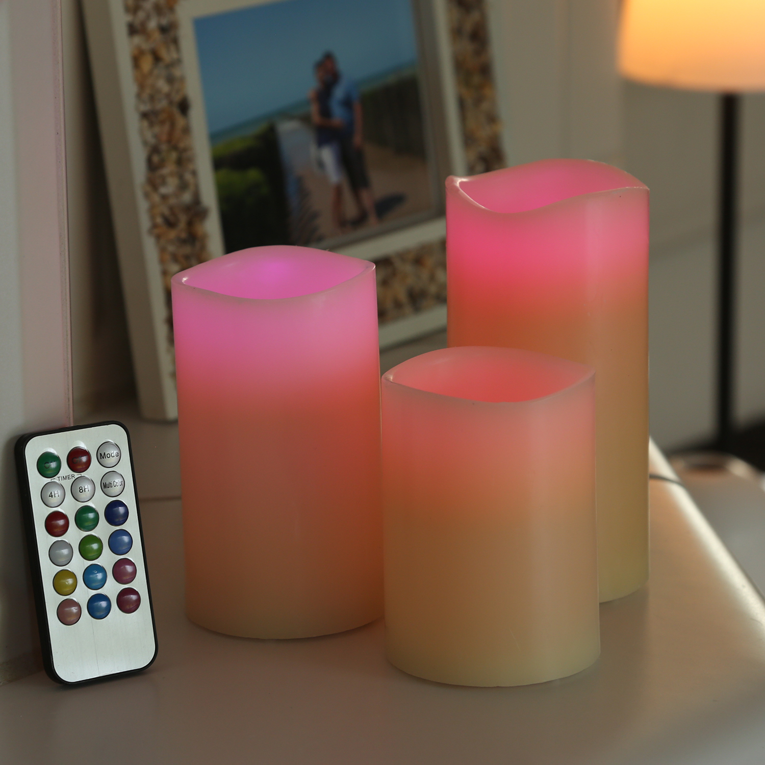LED Kerze MULTI - Echtwachs - bunte LED - D: 7,5cm - inkl. Fernbedienung - Timer - creme - 3er Set LED Kerze MULTI - Echtwachs - bunte LED - D: 7,5cm - inkl. Fernbedienung - Timer - creme - 3er Set