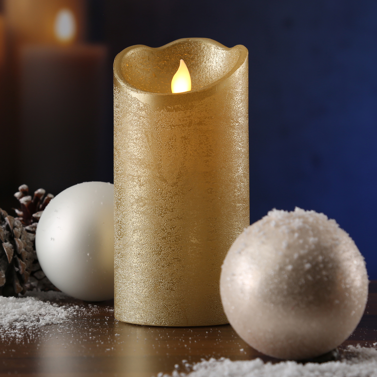 LED Kerze M-TWINKLE - Echtwachs - mechanisch bewegte Flamme - H: 15cm - D: 7,5cm - Timer - gold LED Kerze M-TWINKLE - Echtwachs - mechanisch bewegte Flamme - H: 15cm - D: 7,5cm - Timer - gold