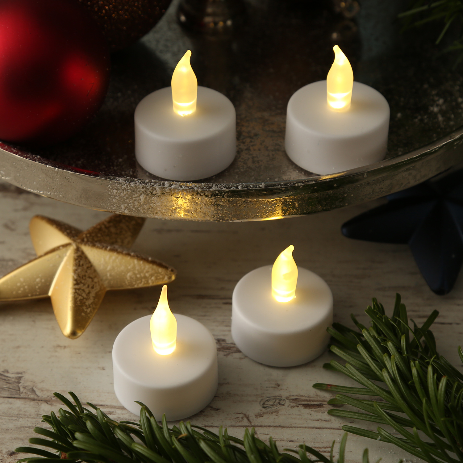 LED Teelichter - warmweiß flackernde Flamme - Kunststoff - D: 3,7cm - inkl. Batterien - weiß - 4Stk. LED Teelichter - warmweiß flackernde Flamme - Kunststoff - D: 3,7cm - inkl. Batterien - weiß - 4Stk.