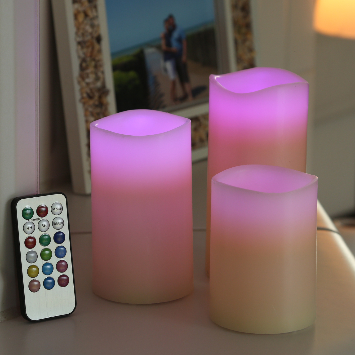 LED Kerze MULTI - Echtwachs - bunte LED - D: 7,5cm - inkl. Fernbedienung - Timer - creme - 3er Set LED Kerze MULTI - Echtwachs - bunte LED - D: 7,5cm - inkl. Fernbedienung - Timer - creme - 3er Set